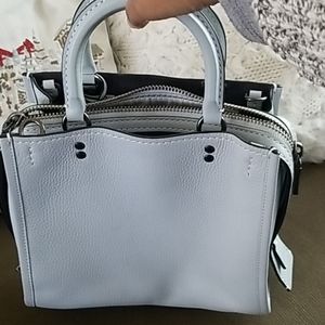 Coach ice blue rogue 25